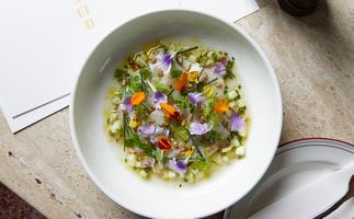 Her Bar in Melbourne, Victoria. Photo of the ceviche decorated with colourful edible flowers.