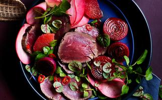 Bistek tagalog recipe of Cured beef with charred sawsawan red onions.
